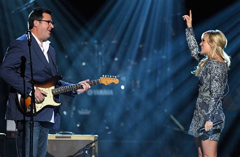 Carrie Underwood and Vince Gill Singing How Great Thou Art: A Blend of Talent in Celestial Harmony